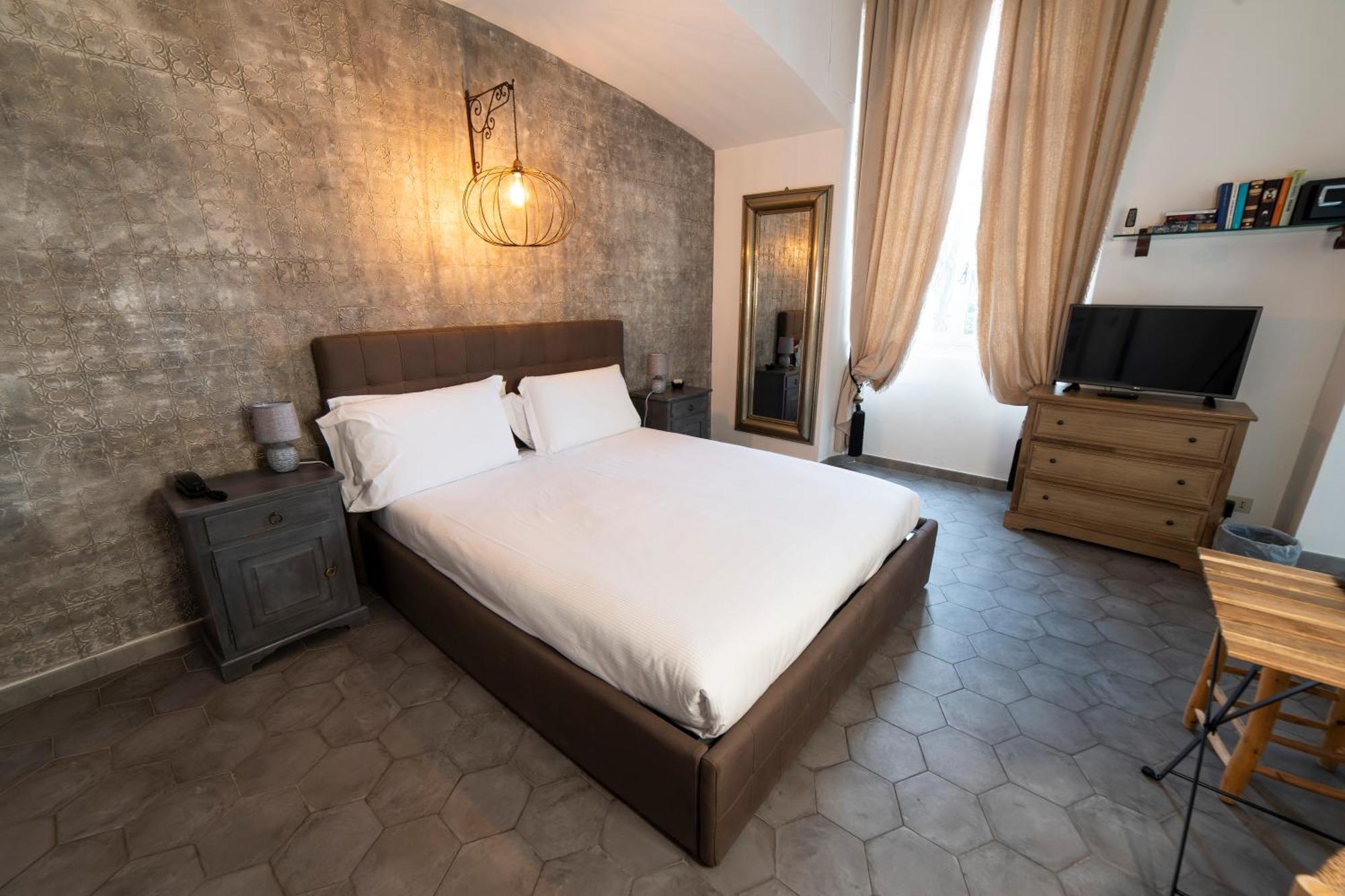 Hotel Miramare Споторно Екстериор снимка