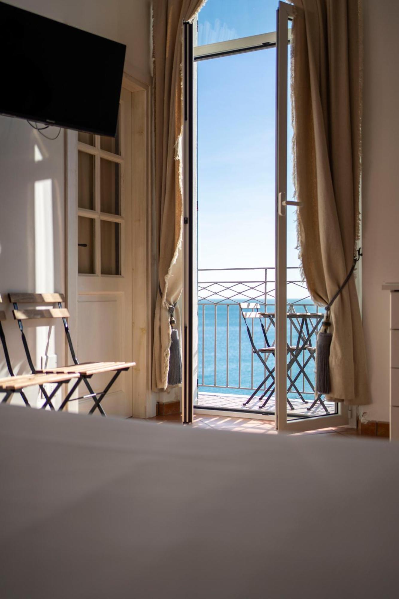 Hotel Miramare Споторно Екстериор снимка